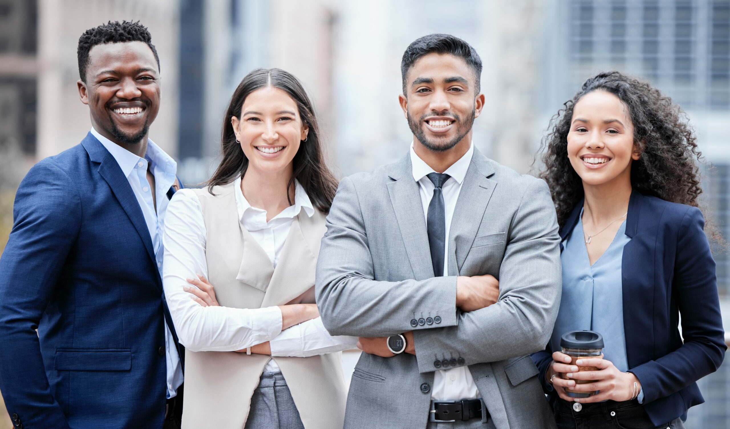What you want exists, so dont settle until you get it. Portrait of a group of confident businesspeople standing with their arms crossed in the city.